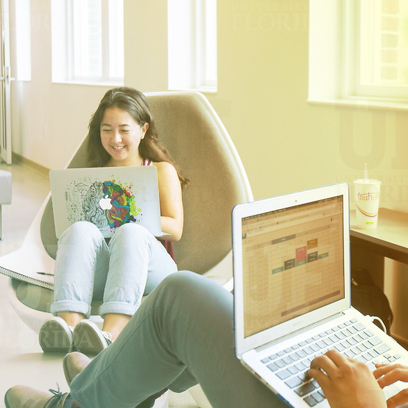 Student on computer at Newell Hall